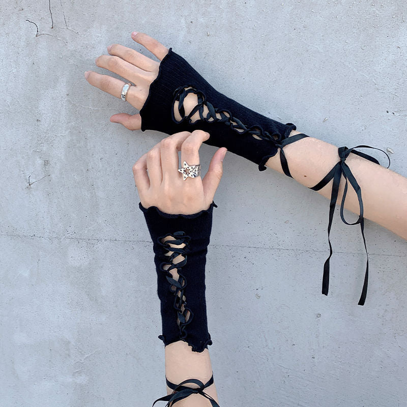 Black Lolita Lace-Up Gloves featuring adjustable black ribbons, ideal for gothic fashion and cosplay.