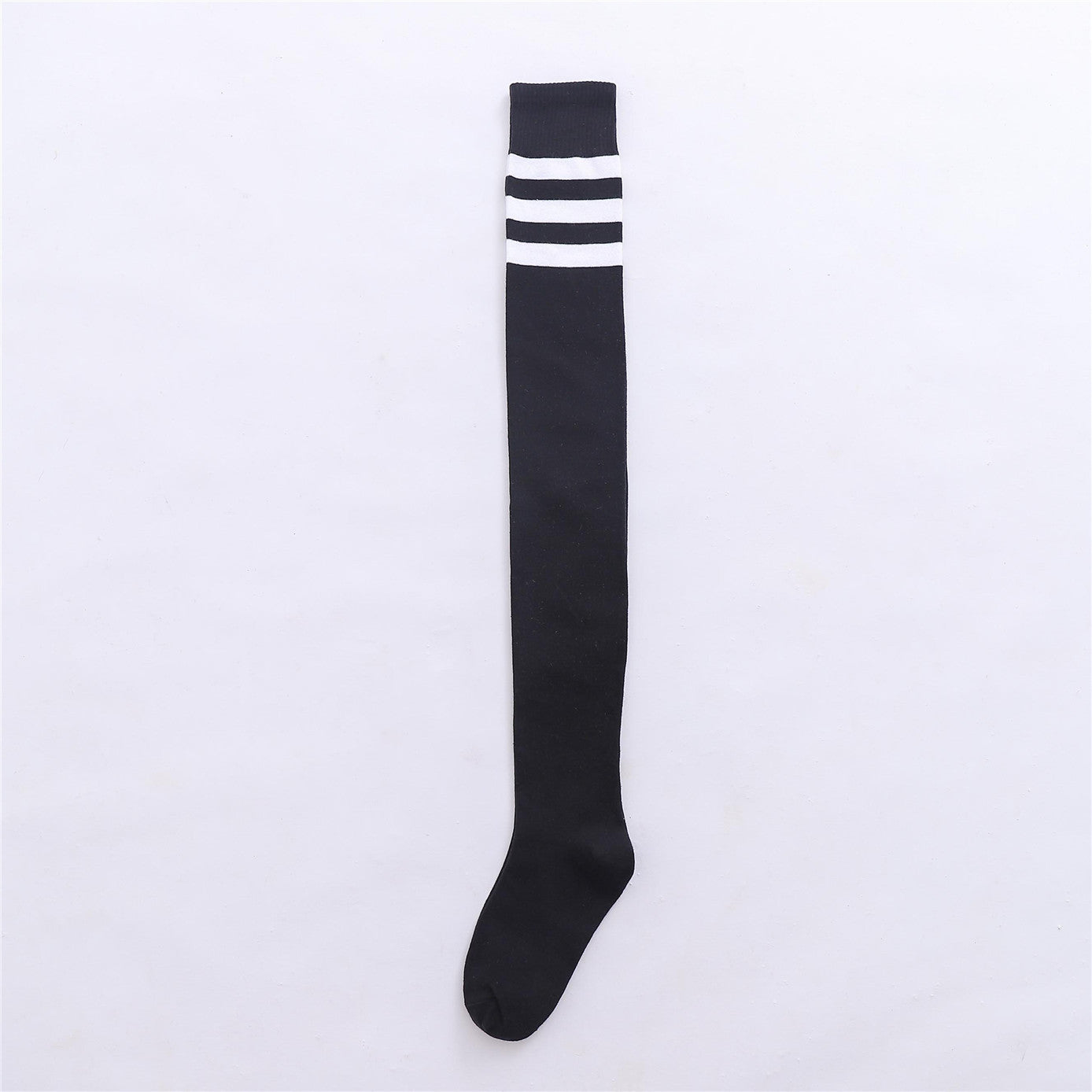 Black thigh-high socks featuring white stripes at the top, perfect for versatile femboy outfits and street fashion.
