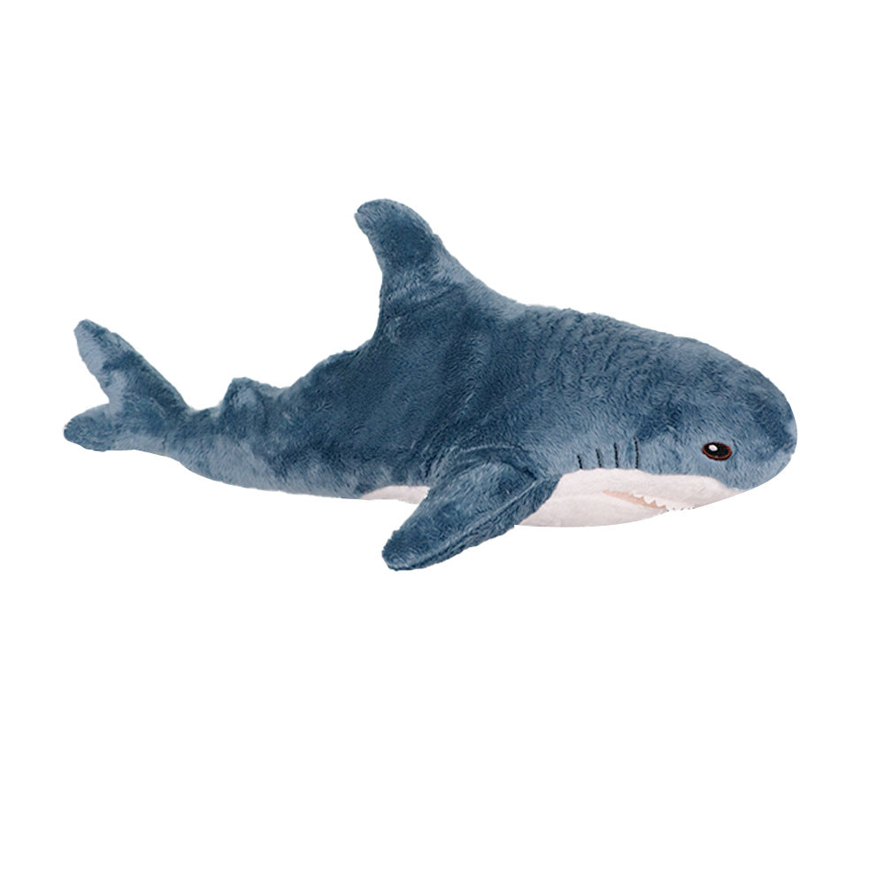 Side profile of blue Femboy Blahaj pillow plushie, cuddly soft shark plush toy, vibrant colours on white background