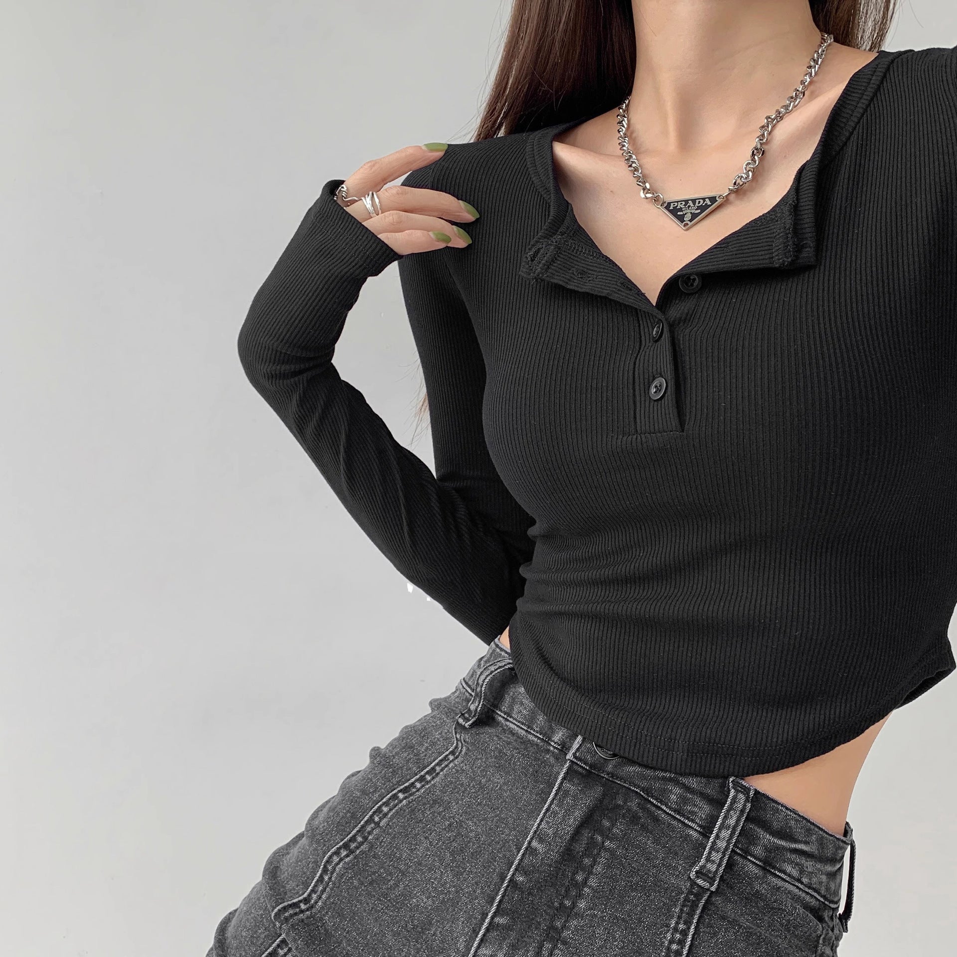 Close-up front shot of black Collar Femboy Long-Sleeve Tee henley buttons, femboy tops.