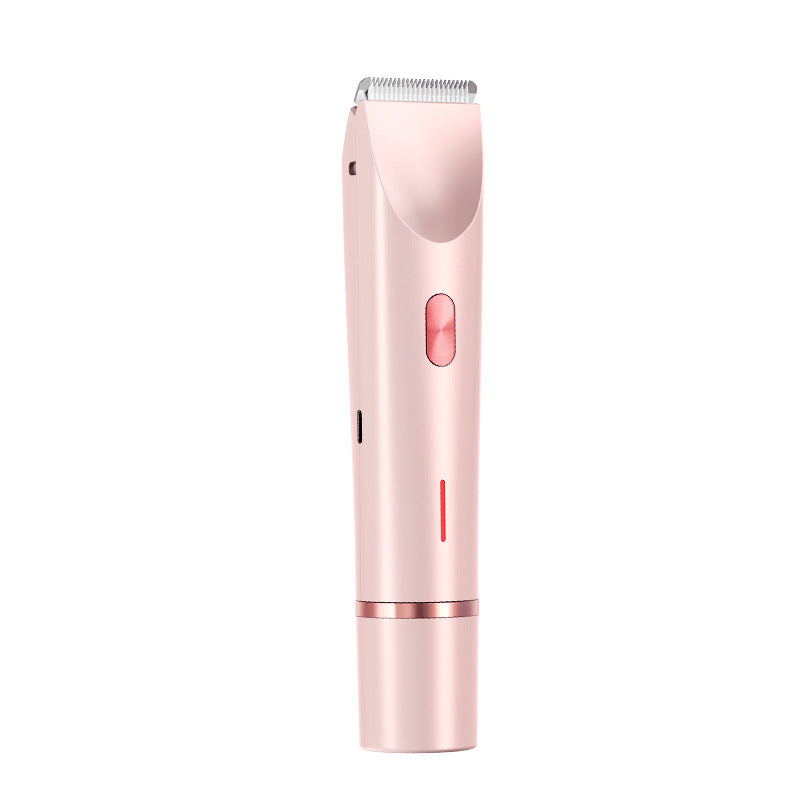 Angled studio view of the dual head femboy shaving kit highlighting the blade head and control button, shown on a white background, electric grooming tool designed for clean and gentle femboy grooming.