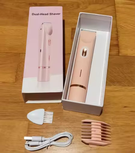 Dual head femboy shaving kit in soft pink shown in a centered product shot on a white background, compact electric shaver designed for smooth and comfortable femboy grooming.