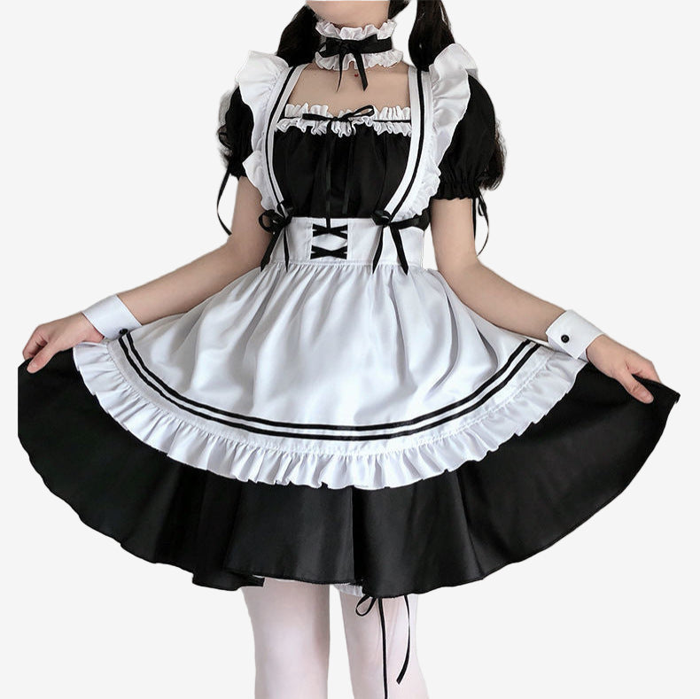 Femboy fashion at its best with a detailed maid outfit, complete with white cuffs and black skirt, tailored for an eye-catching, fashionable ensemble.