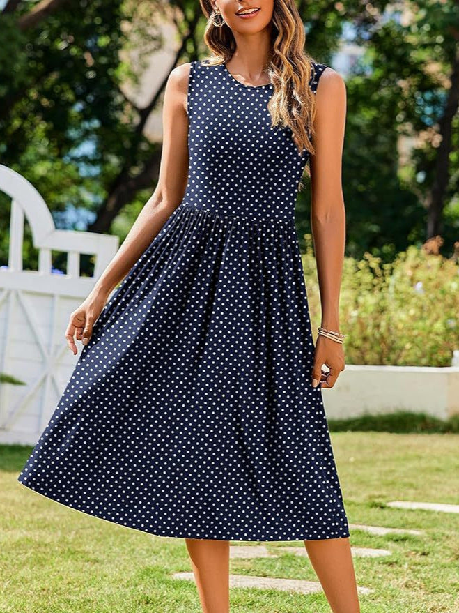 Full‑body front shot of navy polka‑dot Femboy Floral Tank Dress outdoors, cute femboy outfit.