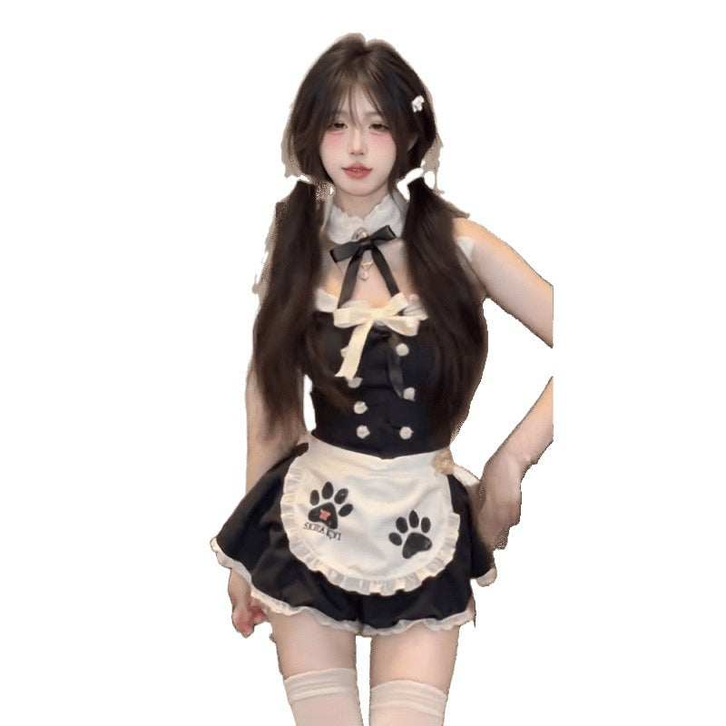 Black femboy maid dress with ribbon bow and white cat paw apron, cute maid cosplay lifestyle shot