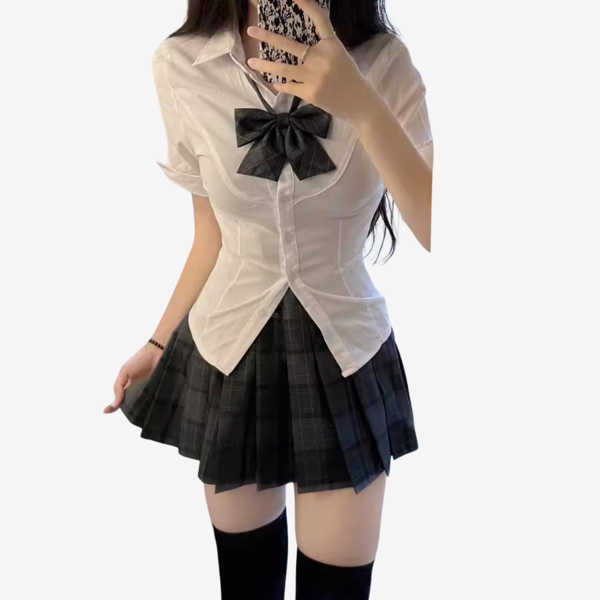 Full look of the Femboy Schoolgirl Kit with a fitted white short sleeve shirt and plaid skirt, styled with a plaid bow, perfect for a stylish femboy outfit on a white background.