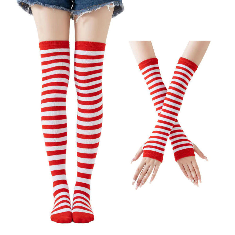 Red and white striped thigh high socks with matching arm warmers worn on legs and hands, soft cotton femboy clothing styled for cute and playful femboy outfits on a white background