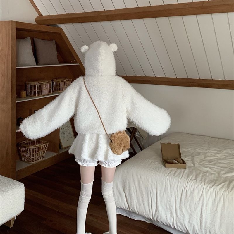 White fluffy bear ear hoodie flatlay showing ear detail, soft kawaii femboy outerwear