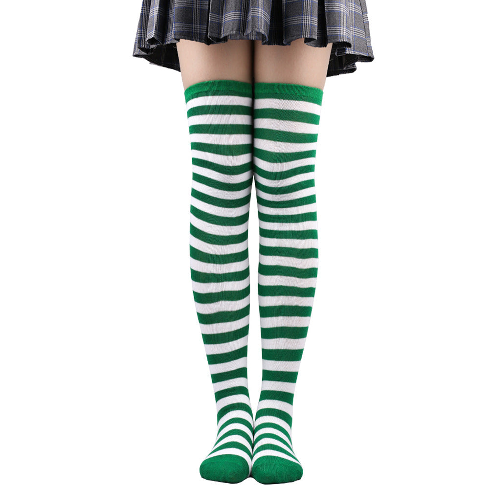 Green and white striped femboy thigh high socks worn on legs, centered front-facing shot on white background, classic striped femboy outfit style.