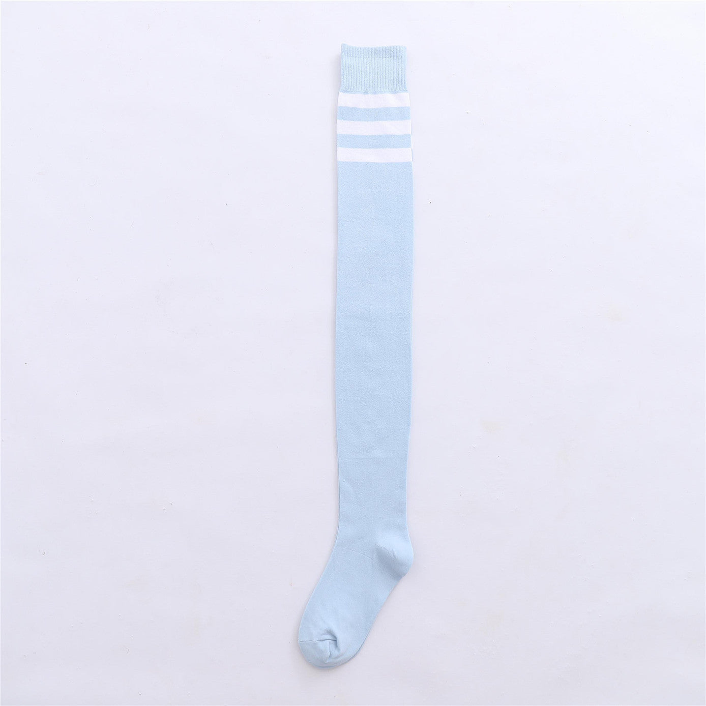 Light blue striped thigh-high femboy socks laid flat on white background, showcasing the cotton material and white stripes near the top.