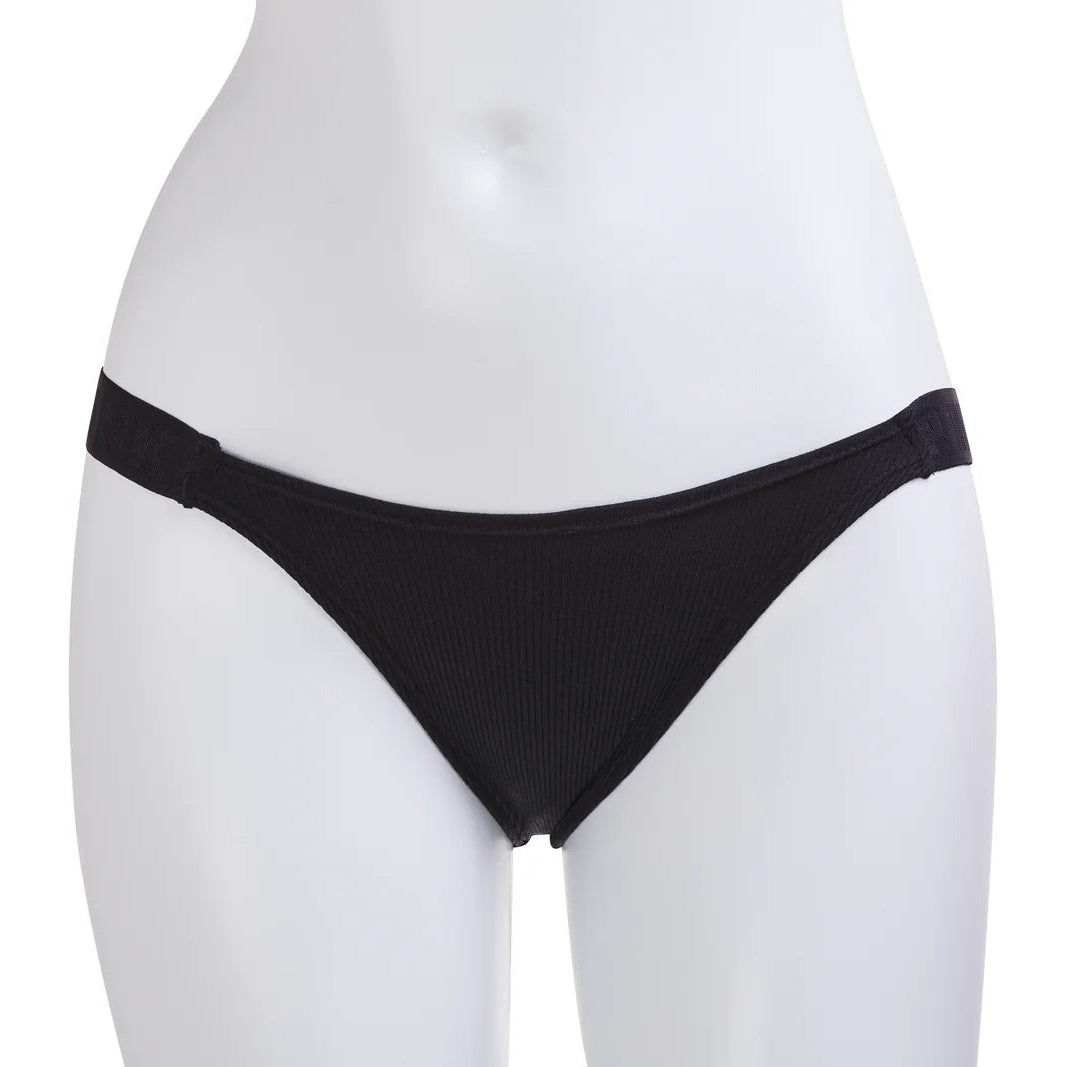 Front-facing mannequin shot showing black seamless femboy briefs with ribbed material and simple low-rise cut, clean white studio background ideal for ecommerce display