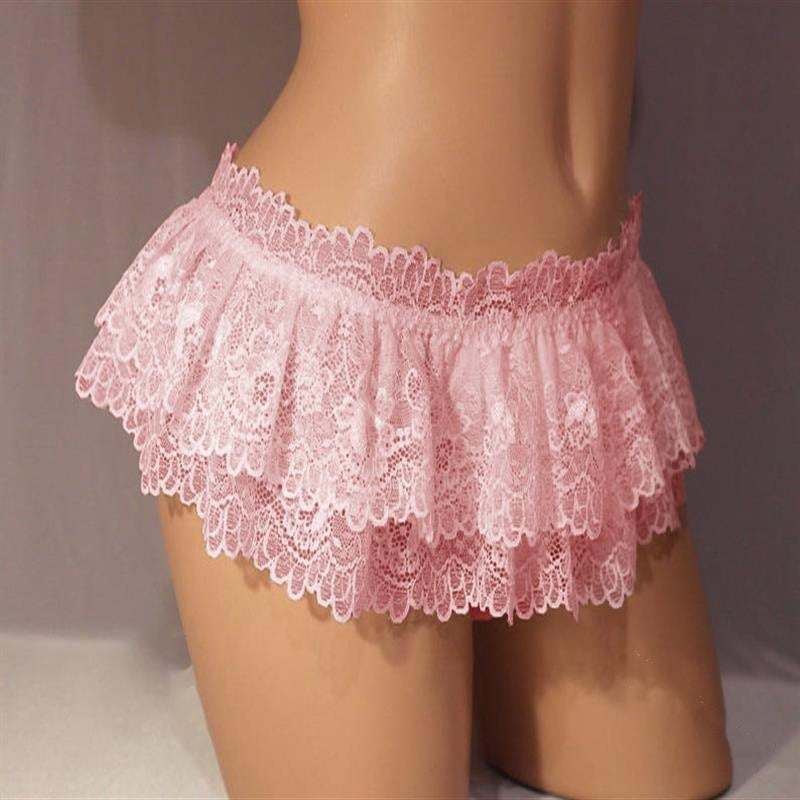 Side view of pink sissy lace mini skirt with double-layer frills and floral lace details, styled for feminine femboy outfits and soft bedroom fashion.