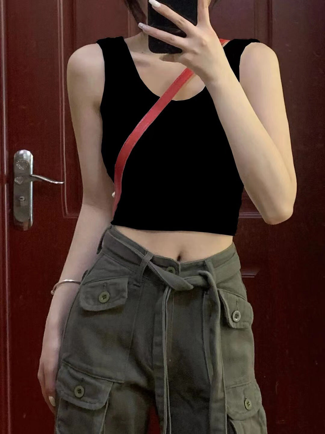 Mirror-selfie front shot of black Summer Femboy Crop Cami, casual femboy outfit.