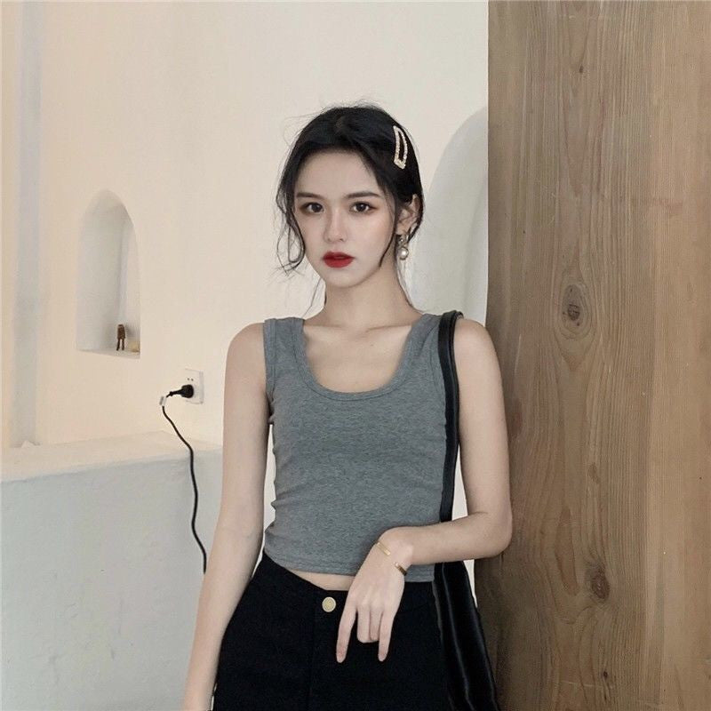 Lifestyle front shot of heather gray Summer Femboy Crop Cami, crop top femboy.