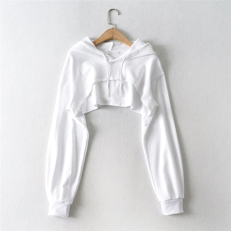 Front view hanging display of white cropped femboy hoodie with long sleeves and soft texture – aesthetic femboy clothing, femboy casual outfit
