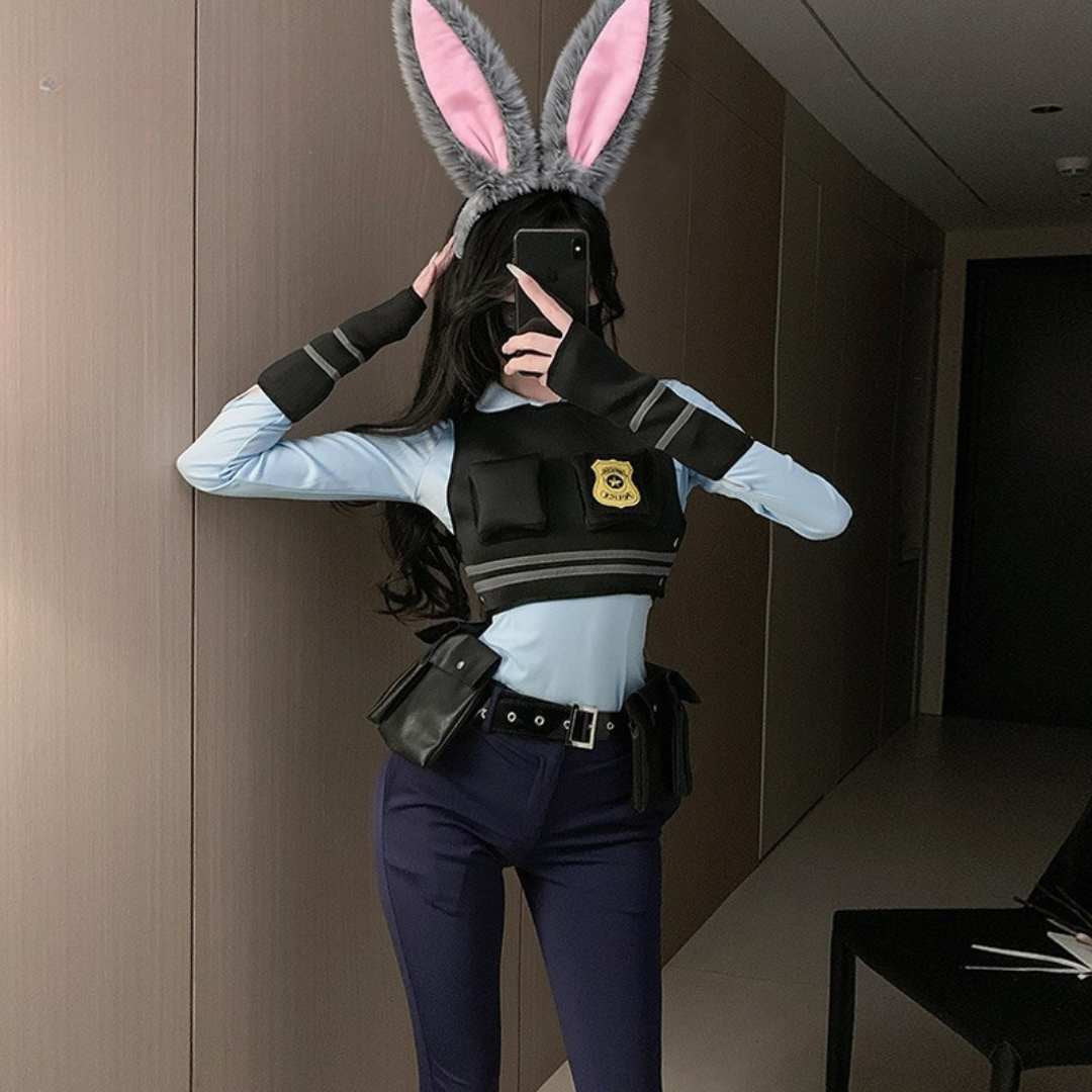 Judy Hopps Zootopia femboy cosplay set with bunny ears, police uniform crop top and navy pants from FemboyBox