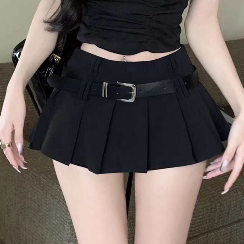 A close-up shot of the black belted mini skirt, showcasing the pleats and belt detail. This staple piece is perfect for femboy outfits, offering a versatile look in femboy fashion.