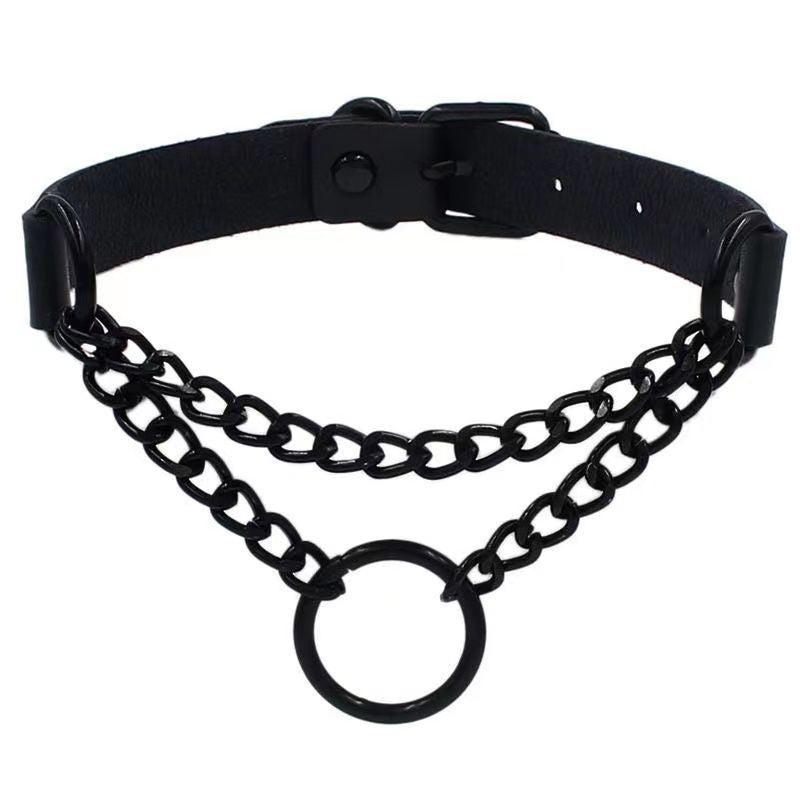 Black gothic femboy choker with matte black chain and circular O-ring detail, adjustable leather strap, edgy femboy fashion choker on white background