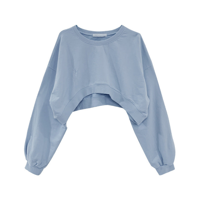 Flat lay front view of pastel blue femboy cropped pullover sweatshirt with loose long sleeves – casual femboy outfit aesthetic, minimalist femboy clothing style