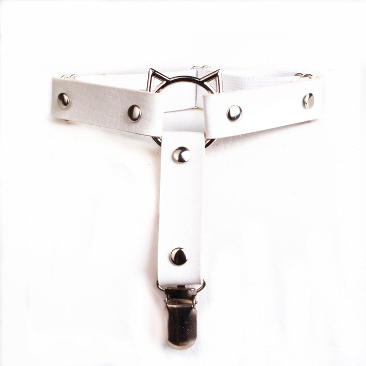Overhead flat lay of the white Cat Face Femboy Thigh Garter captured from a top-down angle, highlighting smooth white faux leather, polished metal studs, adjustable thigh strap, and cat face hardware centerpiece, a clean and aesthetic femboy accessory ideal for soft femboy outfits.