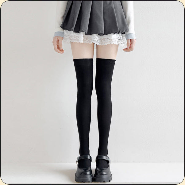 Femboy thigh highs black velvet cat paw grip socks on model