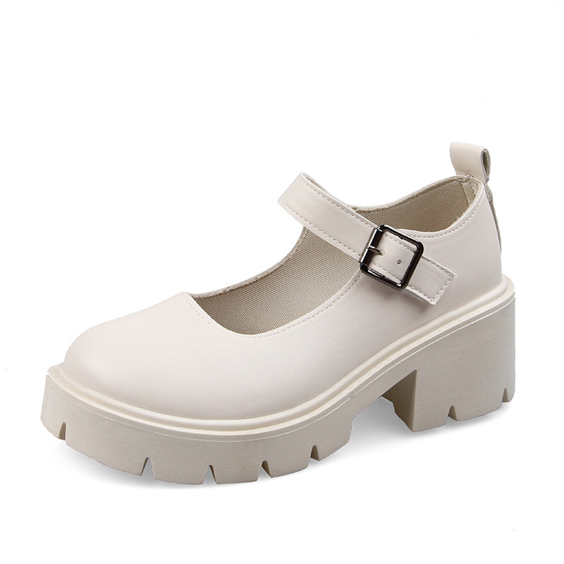 Elegant white school pumps with a matte leather finish and chunky sole, photographed against a plain white background, perfect for femboy clothes.