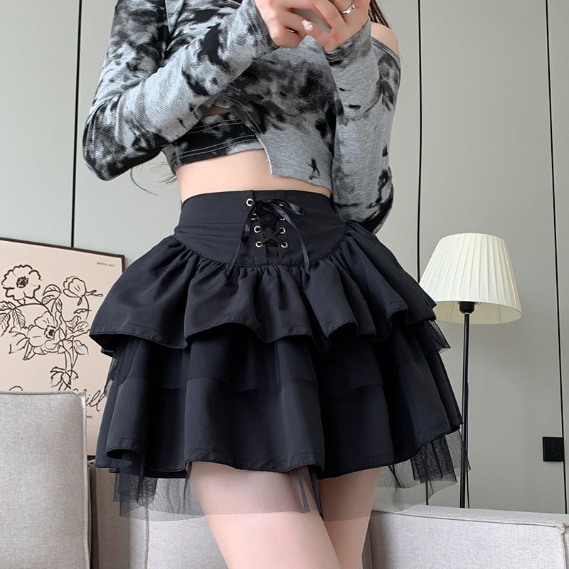 Full view of model in black high-waisted ballet skirt with lace-up front, styled for femboy fashion enthusiasts. Perfect for adding a cute and playful look to femboy clothes collection.