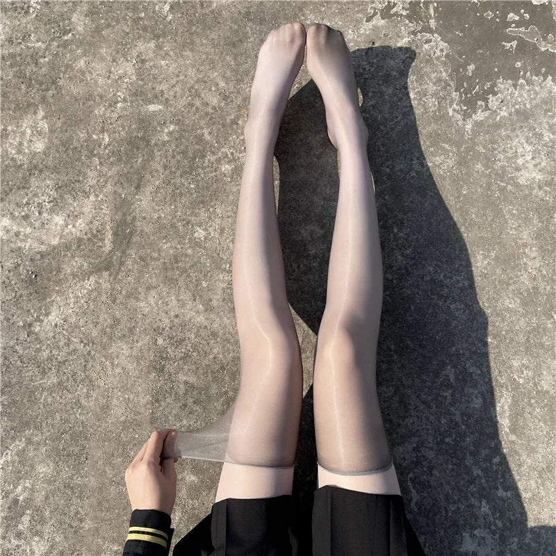 Grey and skin tone glossy ultra-thin thigh highs for femboy outfits, sheer hosiery variants