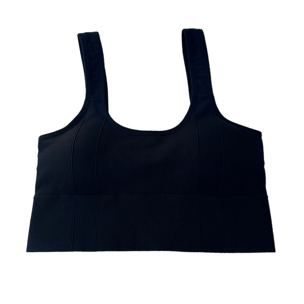 Close-up of a black Seamless Sport Bra on a plain background. The image highlights the ribbed texture and supportive under-bust band, ideal for femboy fitness enthusiasts.