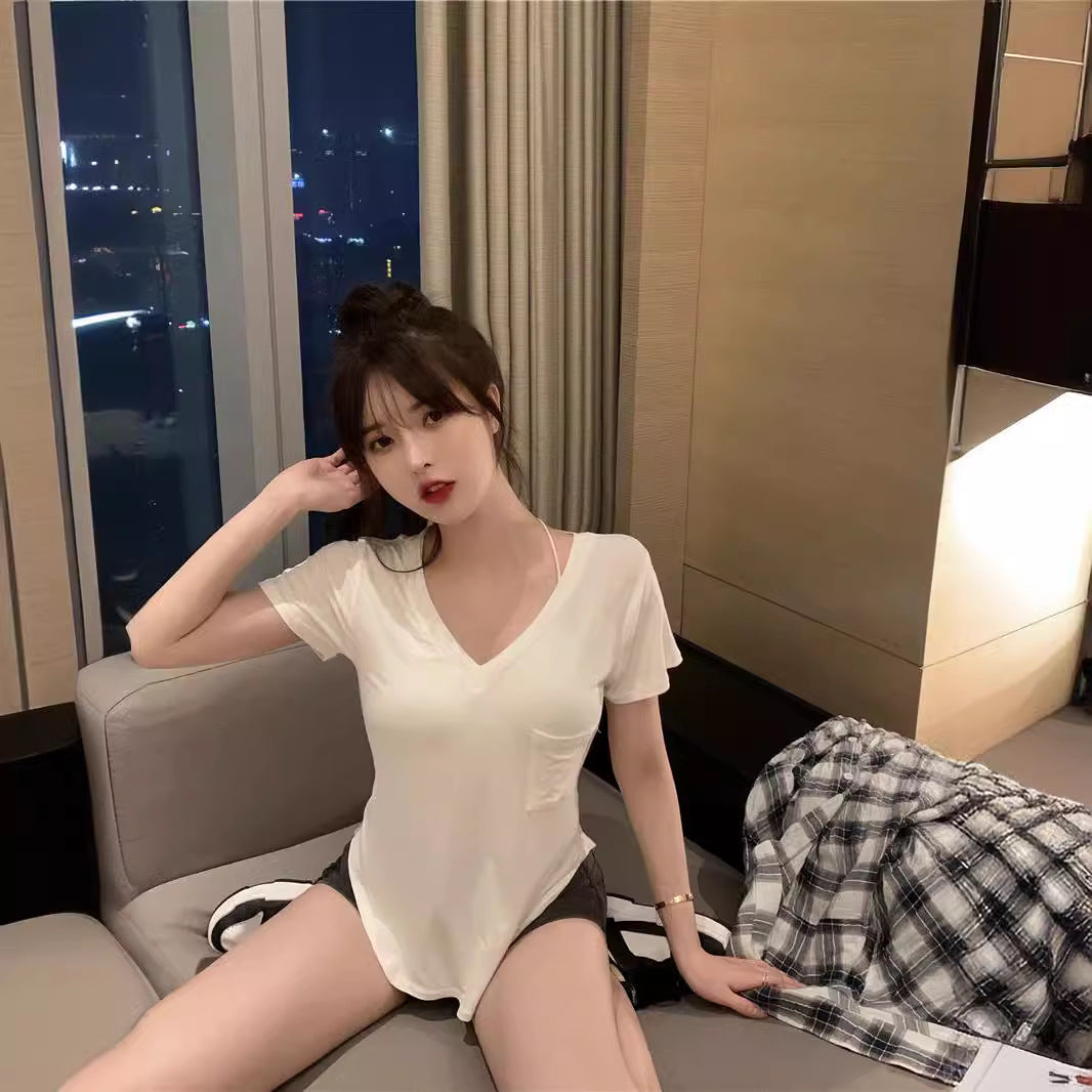 White fitted femboy v-neck t-shirt lifestyle shot, casual femboy outfit with shorts