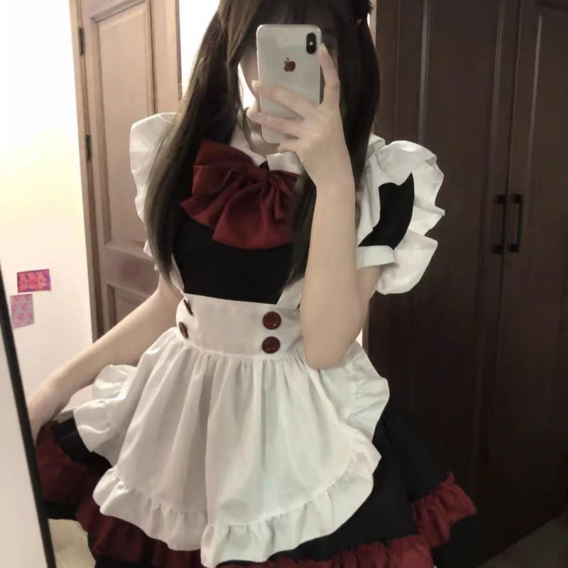 Gothic lolita femboy maid dress mirror selfie, red and black dress with white apron and ruffle detail