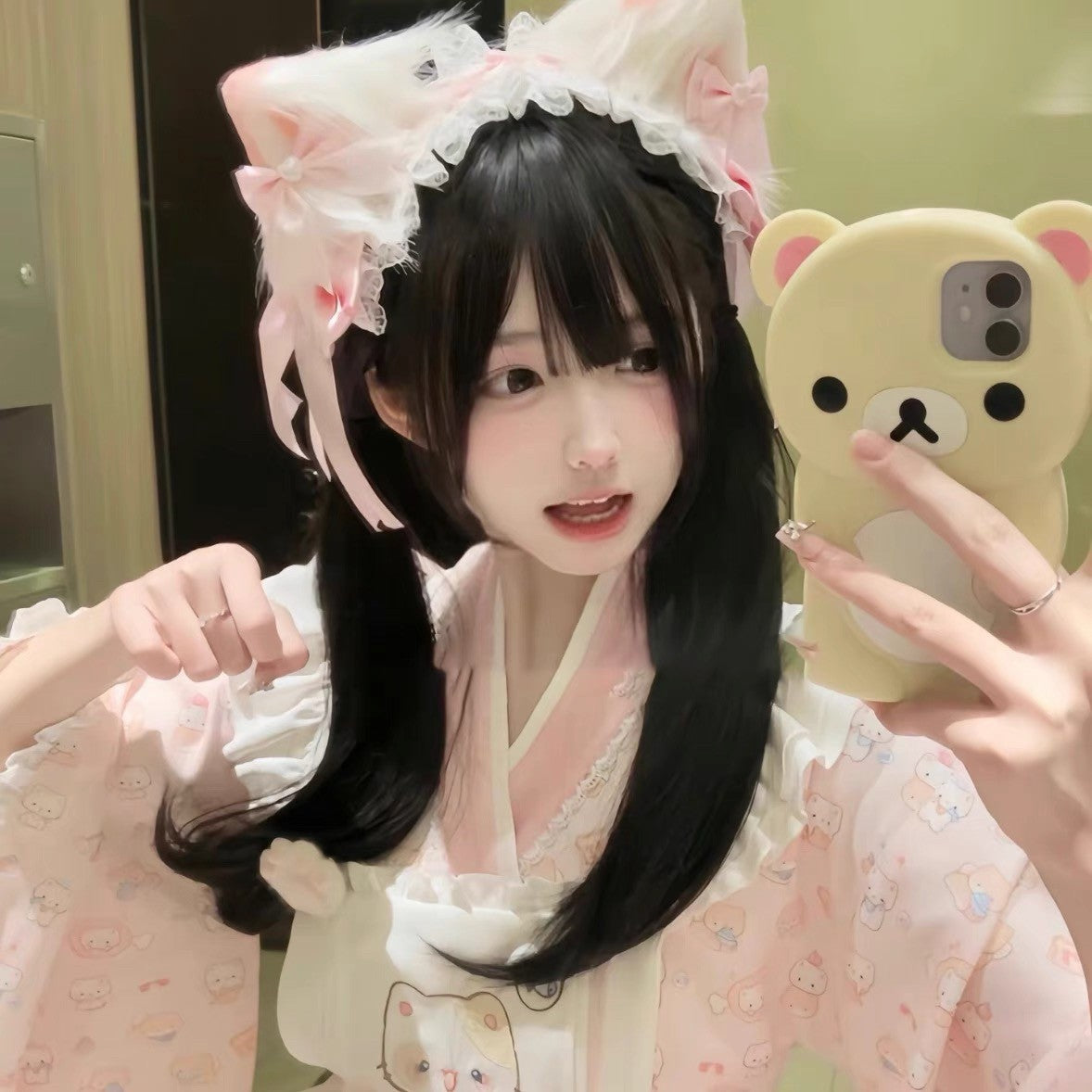 Black and white bow lolita cat ear clips lifestyle shot, kawaii femboy hair accessory