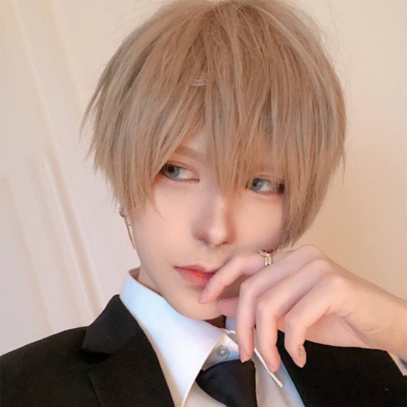 Short bangs femboy wig in ash blonde with textured layers, front-facing portrait shot, soft fluffy finish and natural fringe framing the face, ideal for femboy outfits and modern femboy fashion styling.