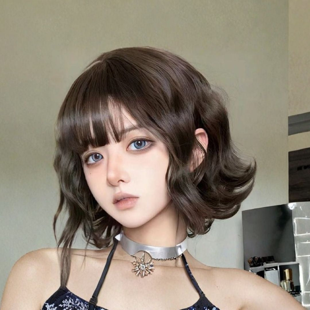 Brown soft curl femboy wig with natural short curls and airy bangs styled for everyday femboy fashion