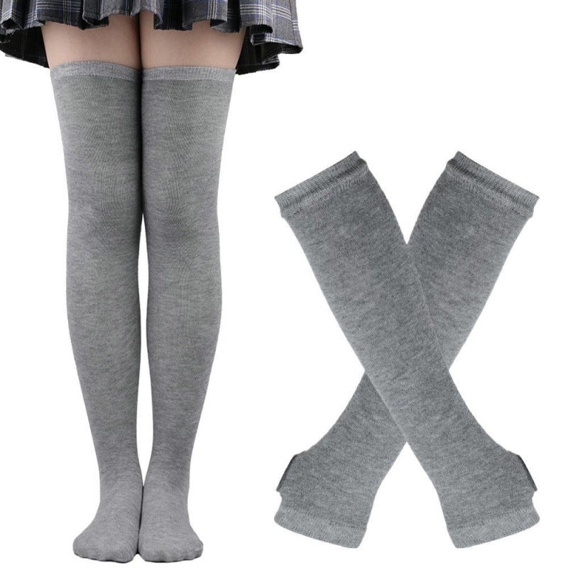 Grey striped thigh high socks worn on model, front-facing full leg shot showing smooth cotton texture, paired with matching grey handwarmers, clean white background, femboy clothing aesthetic.